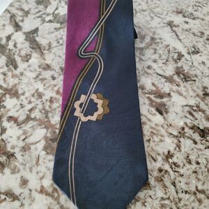 ‎Geometric abstract Pierre Balmain Tie In vibrant colors. Black, purple.
